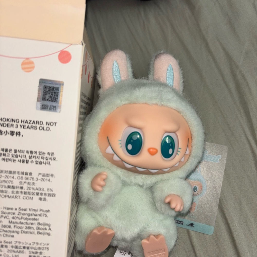 Labubu From Popmart Have a seat Ququ